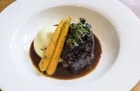 Braised Beef cheek with anchovy, pickled walnuts and mash