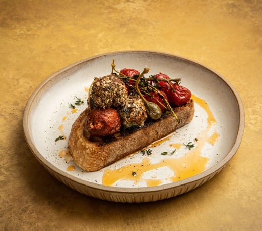 Grilled cherry tomatoes and herby labneh balls