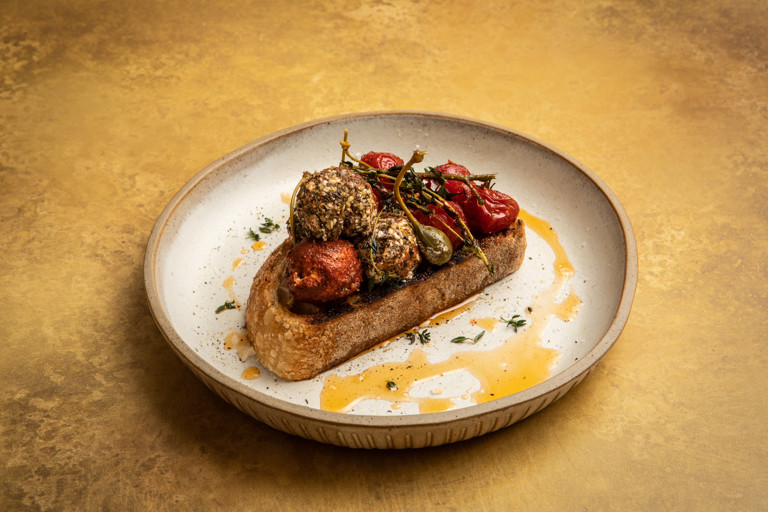 Grilled cherry tomatoes and herby labneh balls