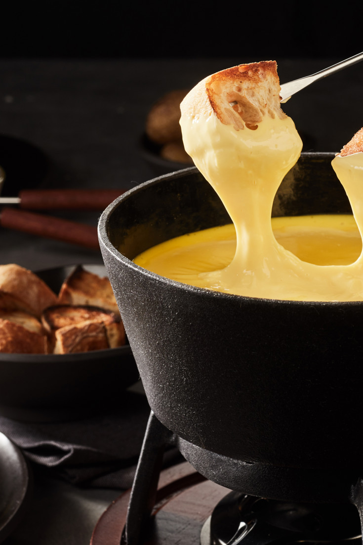 The History and Origins of Swiss Fondue Great British Chefs