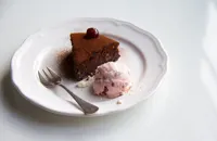 Chocolate nut torte with cherry meringue ice cream