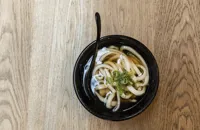 Homemade udon noodles in dashi