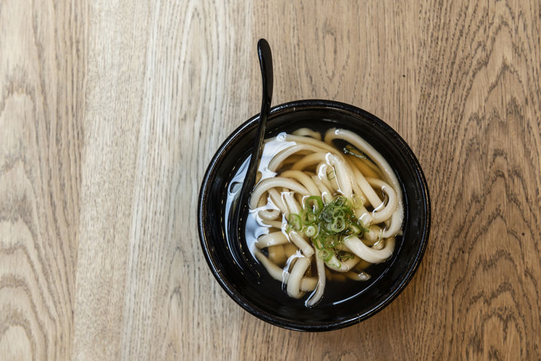 Homemade udon noodles in dashi