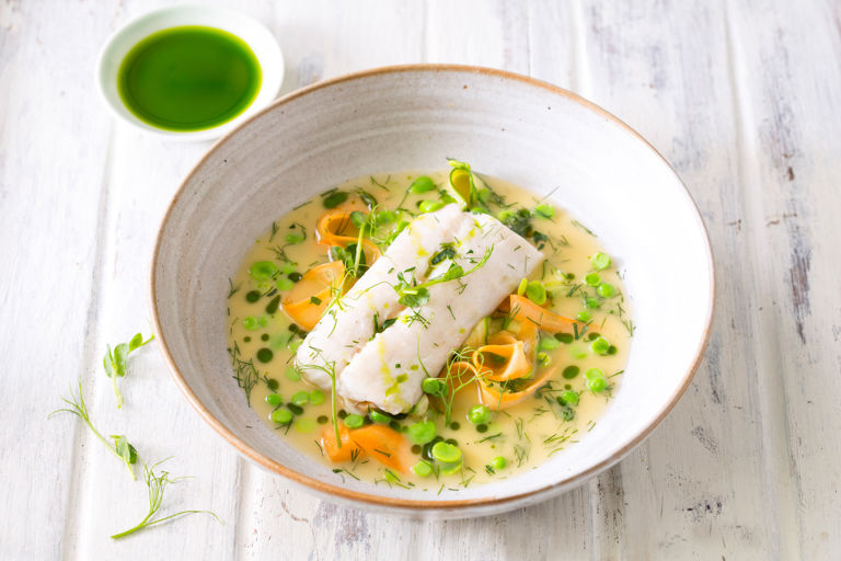 Baked hake with summer vegetables and dill oil