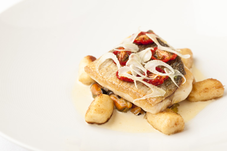 Pan-fried sea bass with Brancaster mussels, gnocchi and fennel