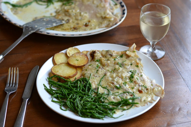 Baked skate wings with mushroom, shallot and Gruyère gratin