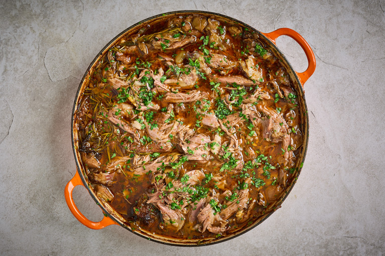 Slow-braised spiced hogget shoulder with rose harissa and artichokes