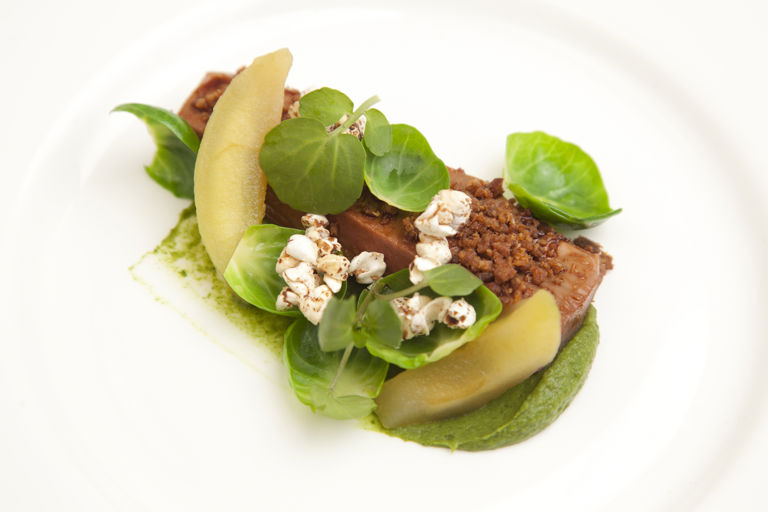 Poached duck with Brussels sprouts, apple and buckwheat