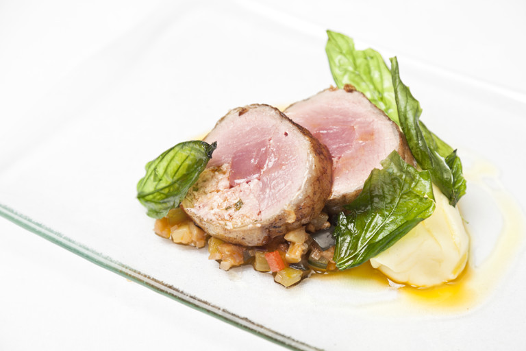Double loin of lamb with a lemon and mint stuffing on rustic ratatouille