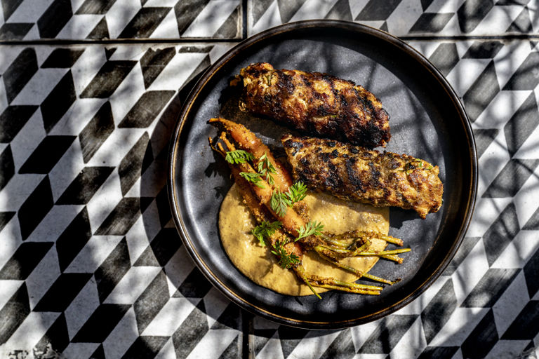 Rabbit and pork fat kebab with Sulla sauce and carrot pickle