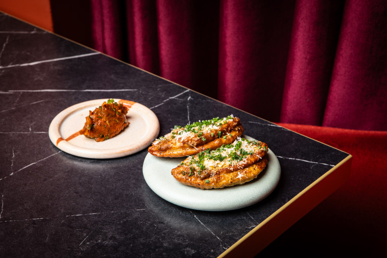 Plantain and feta hand pies with tomato salsa