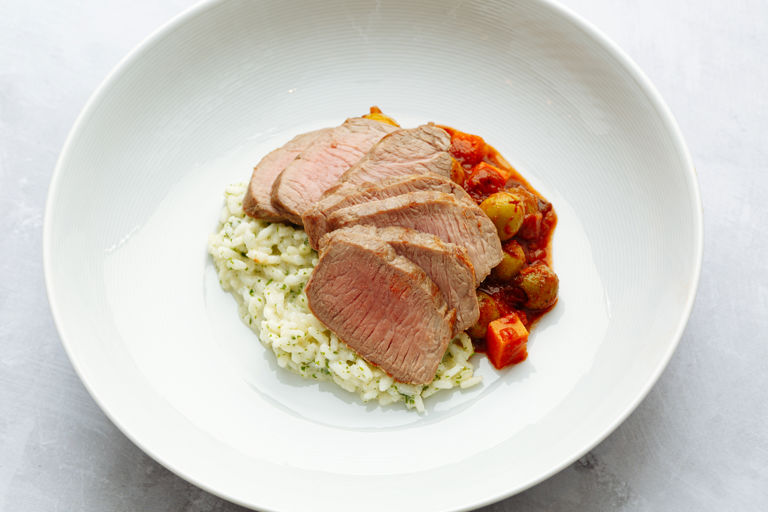 Lamb loin with sumac, lemon, olives and herb risotto