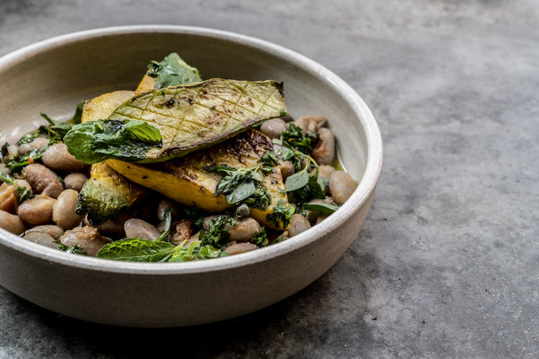 Baked courgette with borlotti beans and salsa verde