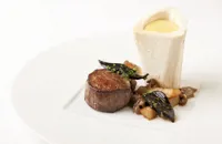 Beef fillet with marrow bones, oyster sabayon and girolle mushrooms