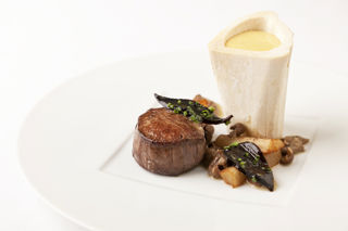 Beef fillet with marrow bones, oyster sabayon and girolle mushrooms