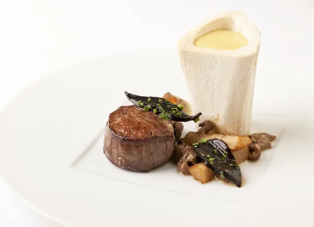 Beef fillet with marrow bones, oyster sabayon and girolle mushrooms
