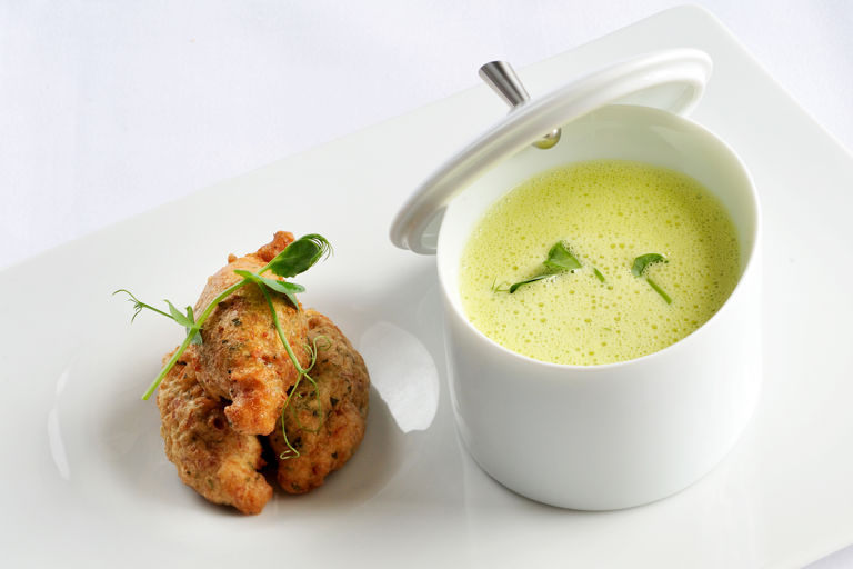 Sweet pea and toffee soup with hog’s pudding fritter