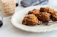 Crispy chicken thighs with Grana Padano breadcrumbs