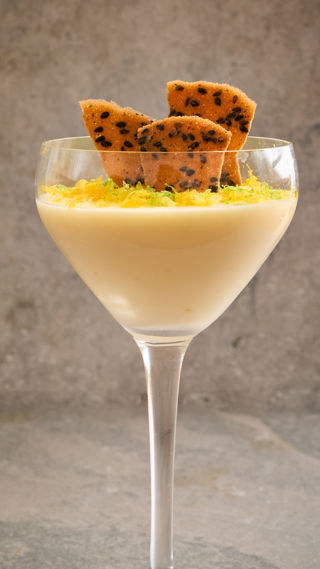 Yuzu posset with a black sesame tuile recipe reel