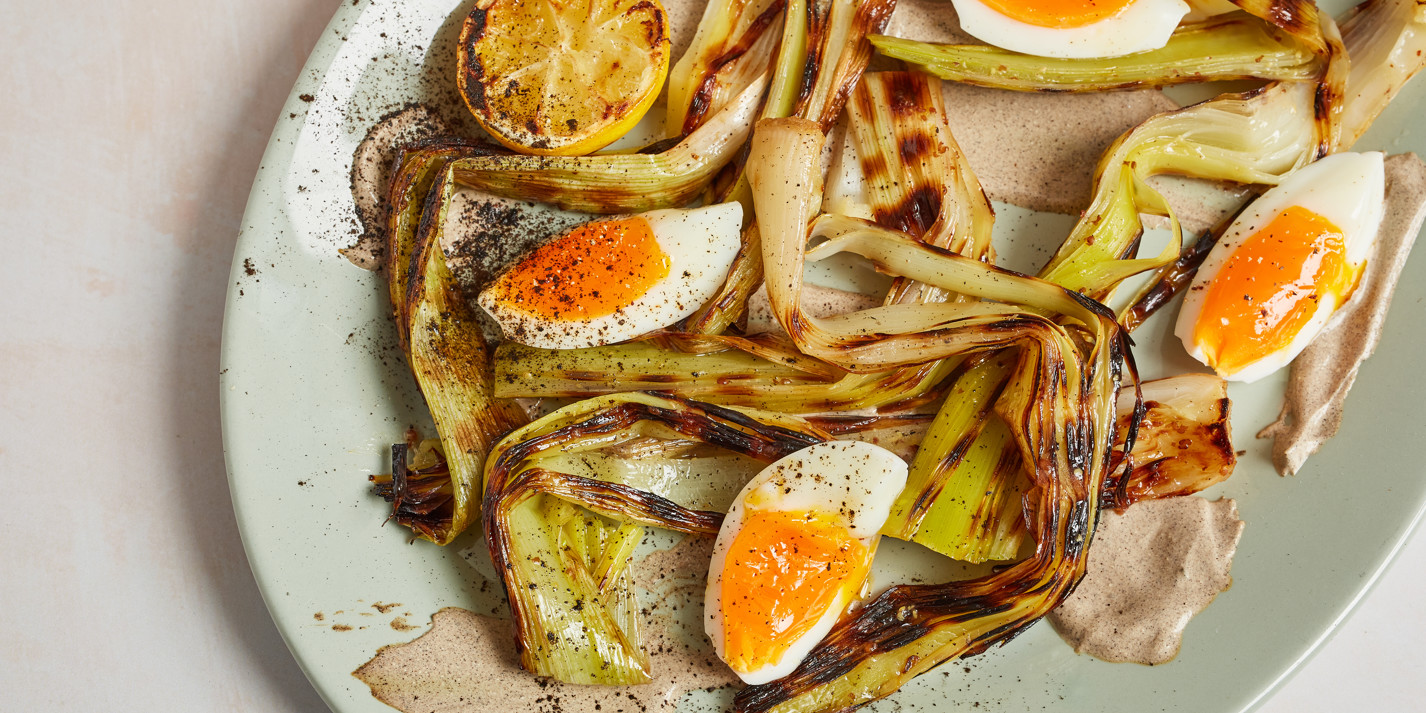 image of Charred Leeks With Leek Ash Crème Fraîche, Burnt Citrus Dressing and Soft Egg recipe by Great British Chefs