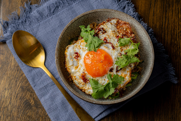 Ultimate fried egg with rice, sesame and chilli oil