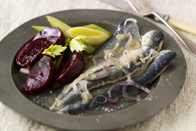 Marinated herrings with beetroot, leeks and horseradish