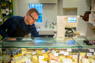 Making truffled cheese at Pistachio & Pickle Dairy
