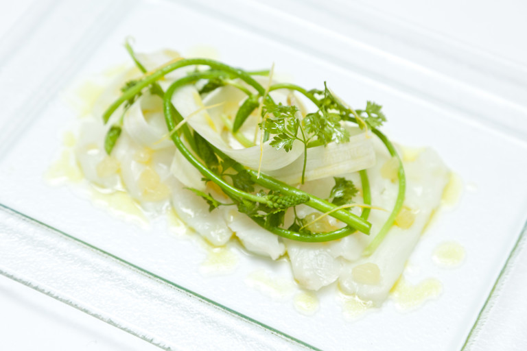 Alaska halibut marinated in lemon vinegar with asparagus and chervil salad