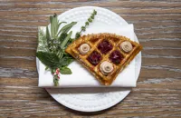 Waffles with chicken liver parfait and red wine shallots