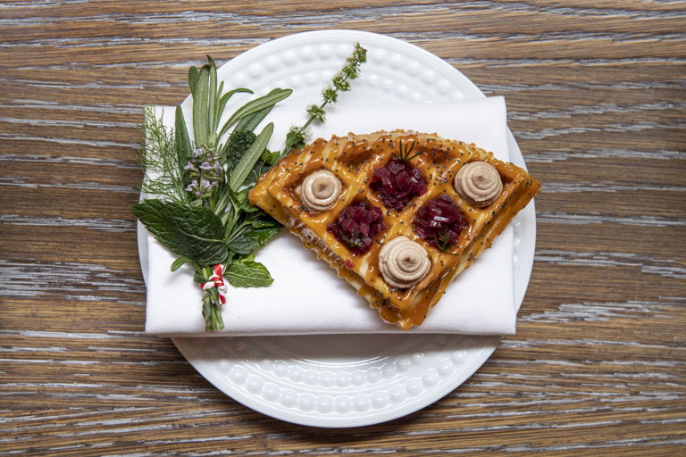 Waffles with chicken liver parfait and red wine shallots