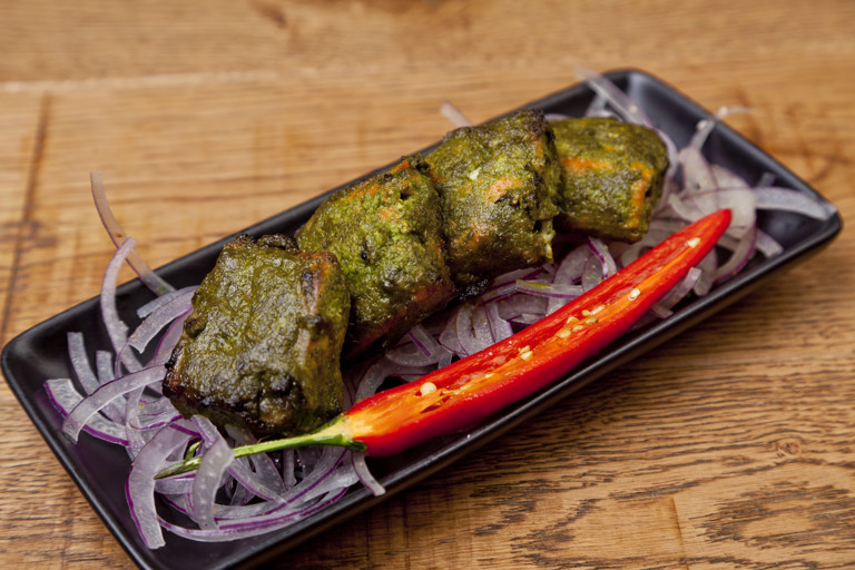 Tandoor-grilled Alaska salmon with lime-leaf and spinach marinade