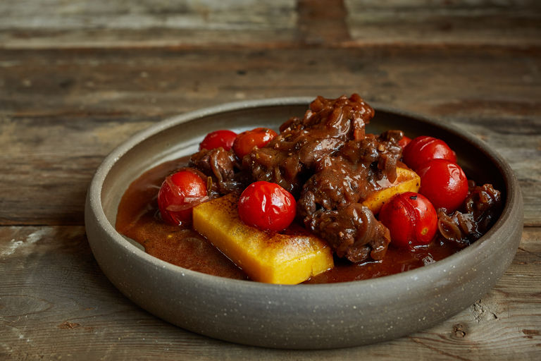 Venison, tomato and rosemary ragu with grilled polenta