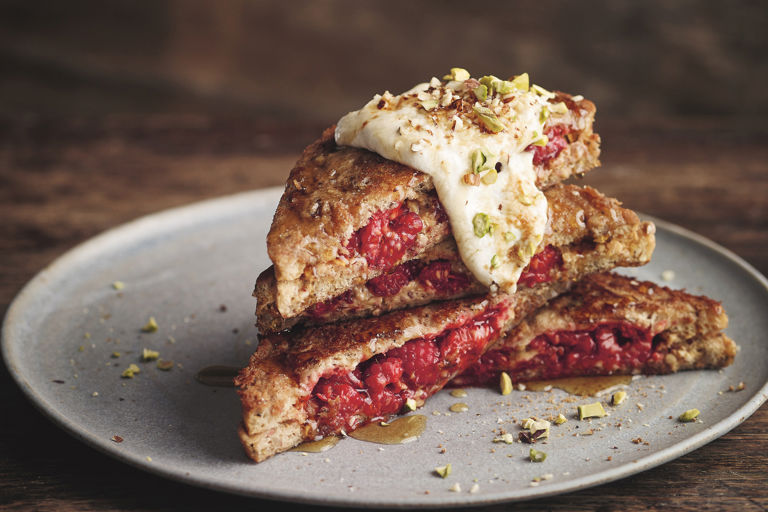 Almond butter and smashed raspberry stuffed French toast