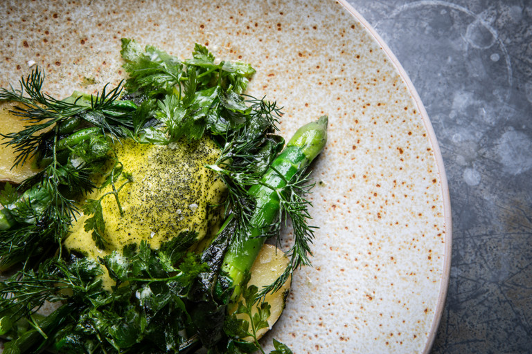 Asparagus with perfect poached egg, pink fir potatoes and seaweed hollandaise