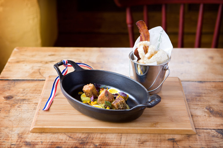 Pork fritters with pub piccalilli, apple sauce and soft poached quail's eggs