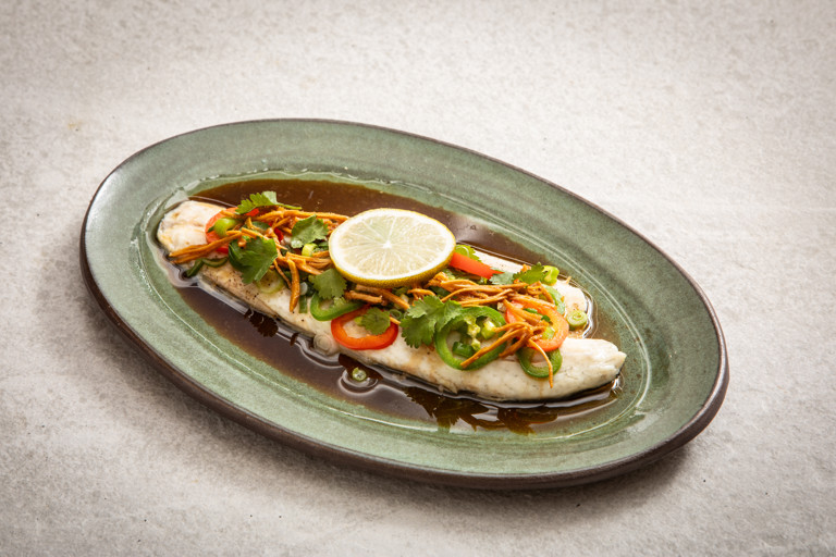 Steamed sea bass with ginger, soy and sizzling chilli oil