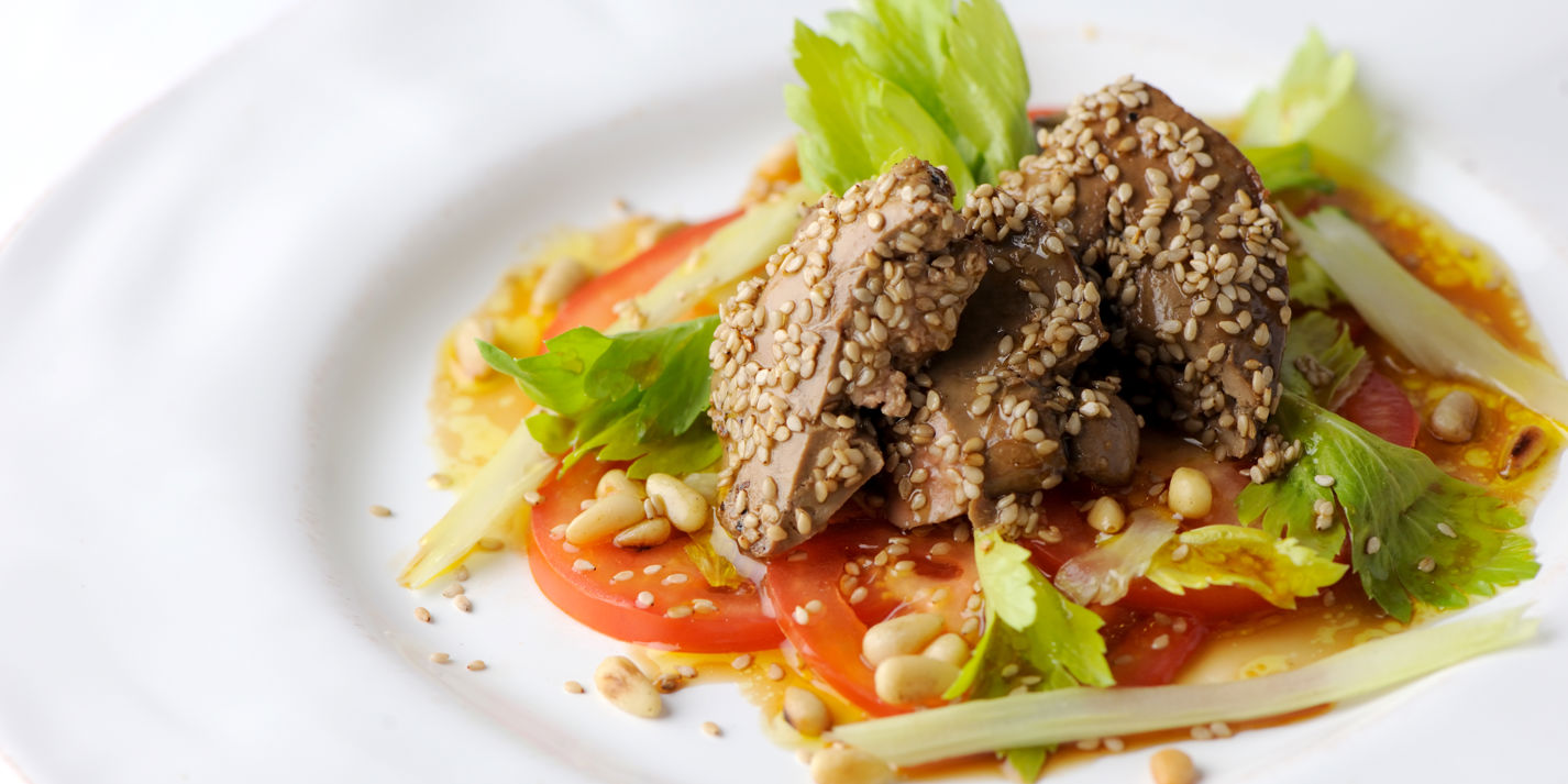Crispy sesame duck livers with a celery, tomato and pine nut salad
