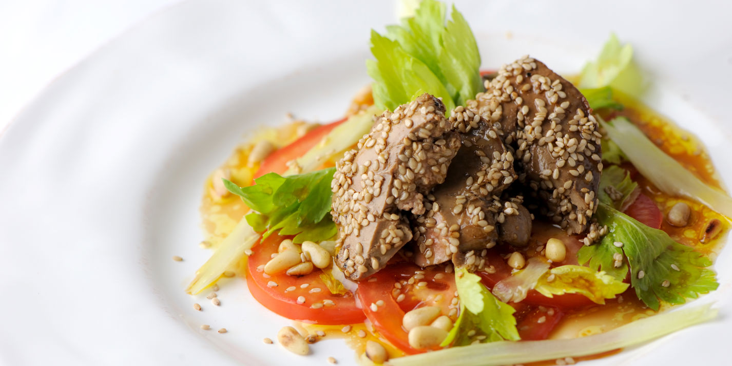 Crispy sesame duck livers with a celery, tomato and pine nut salad