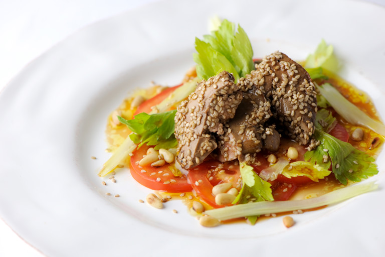 Crispy sesame duck livers with a celery, tomato and pine nut salad