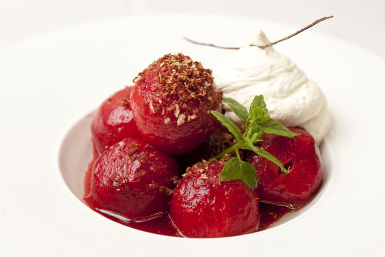 Baked spiced plums with cream chantilly