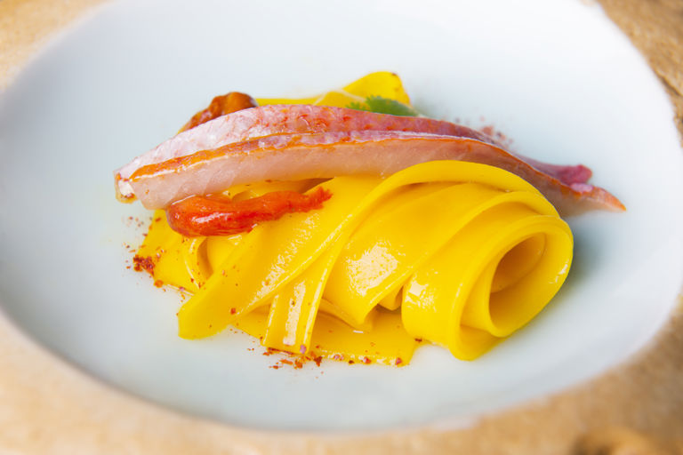 Rice tagliatelle, red mullet, peppers and bottarga