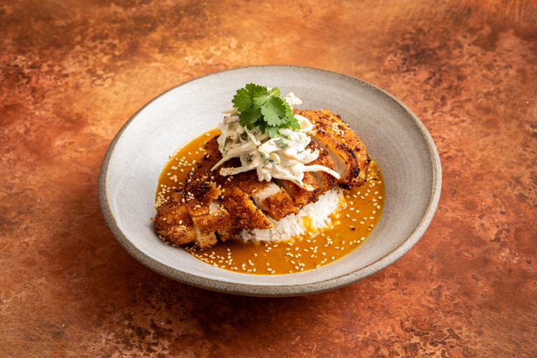 Tonkatsu curry with spiced celeriac and apple slaw