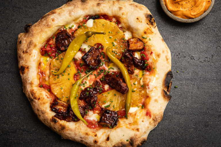 Sourdough pizza with pork belly, pineapple and gochujang butter