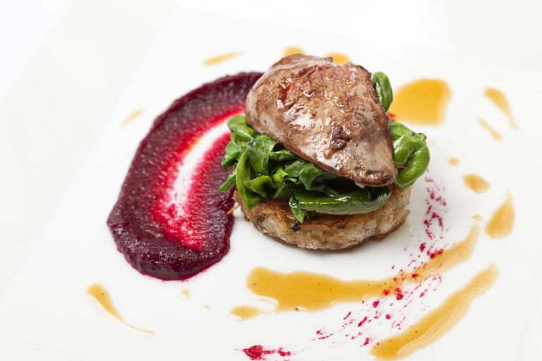Sautéed chicken liver on potato rosti, spinach, young beetroot and bacon