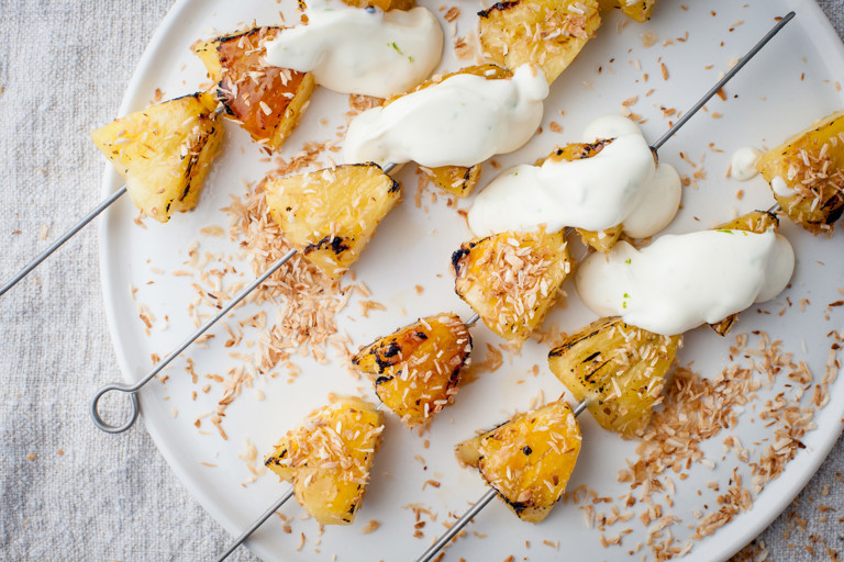 Pineapple kebabs with lime crème fraîche and toasted coconut