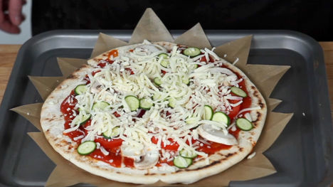 How to top a pizza