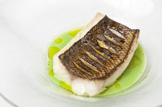 Wild sea bass with pea and mint soup