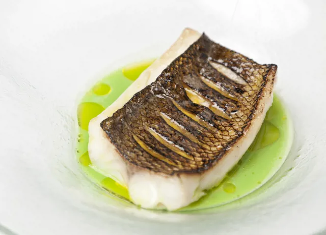 Wild sea bass with pea and mint soup