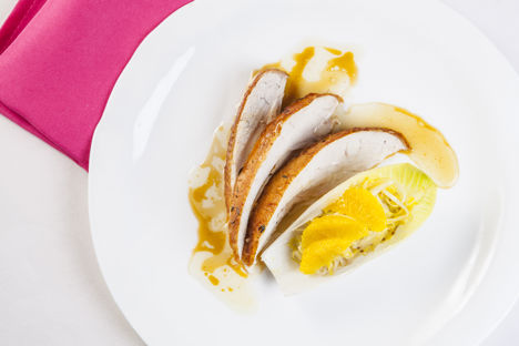Lemon-baked chicken with chicory salad and citrus dressing
