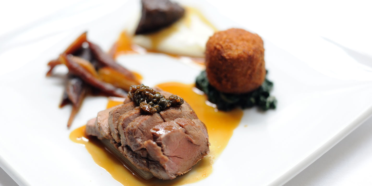 Pork cooked three ways with cauliflower purée, Swiss chard and Ravigôte sauce